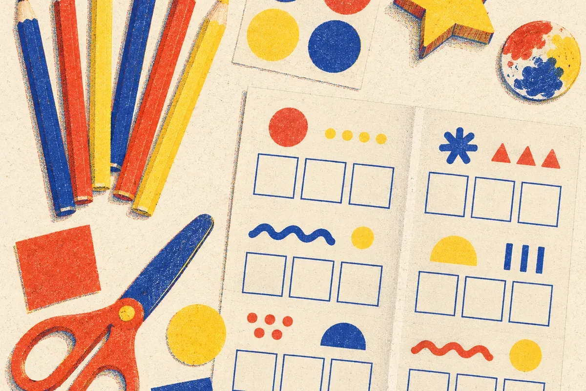 Crayons de couleur, gommettes rondes et carrées posés autour d'une grille de mots fléchés pour le CP