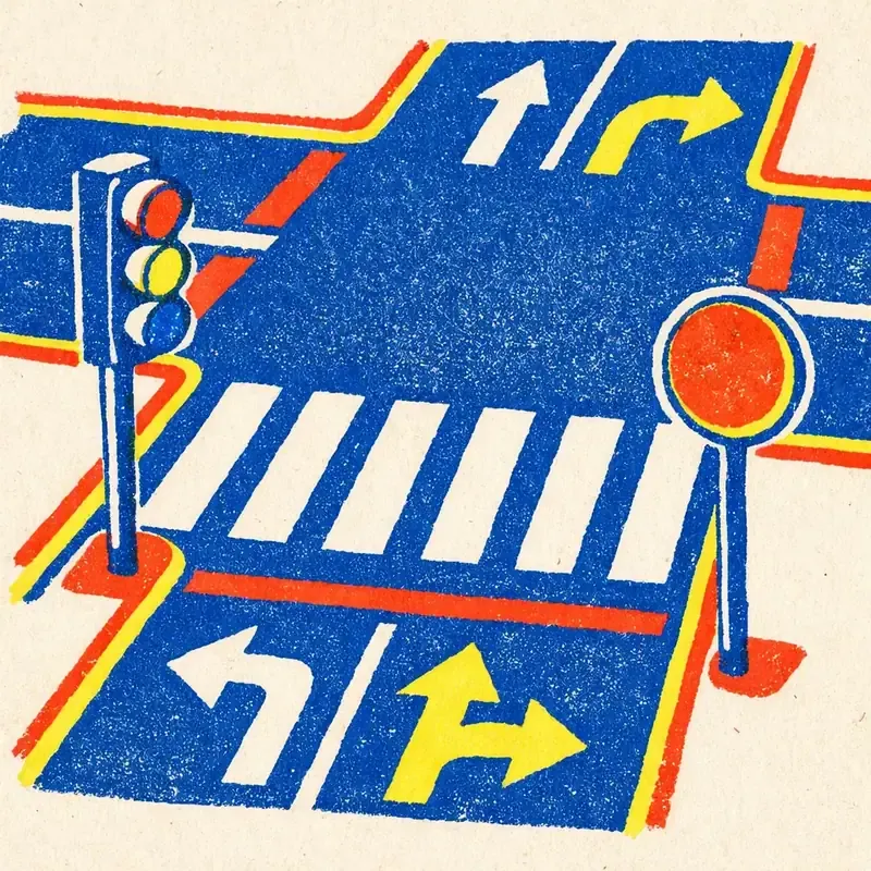Passage piéton peint au sol avec panneau de signalisation et feu tricolore au carrefour d'une rue